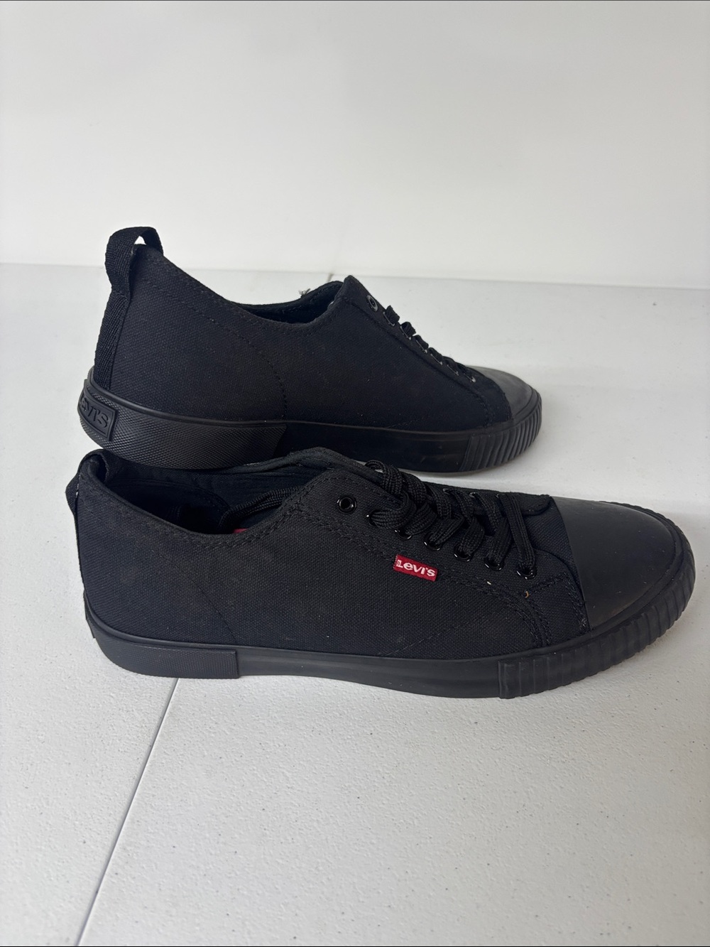 Levi's Black Canvas Low-Top Sneakers with Red Logo Tab